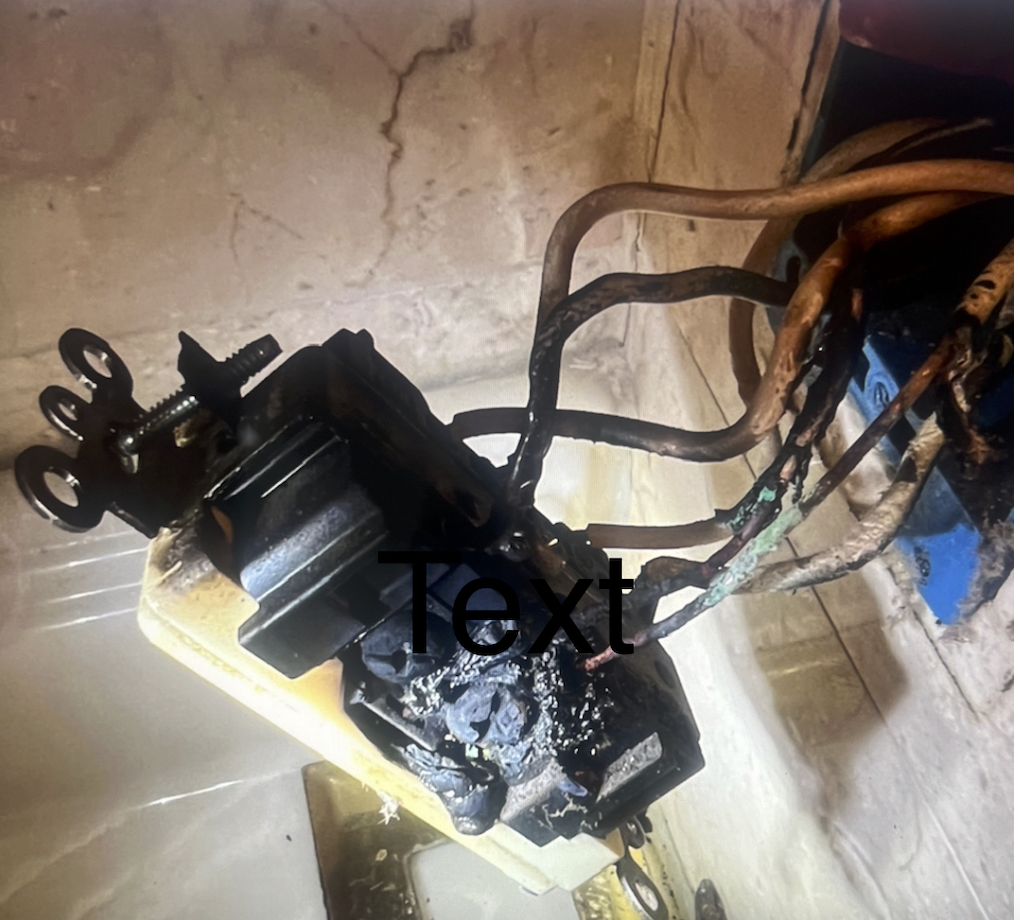 Outlet Replacement Encinitas CA — burned outlet with overheated wiring requiring immediate replacement