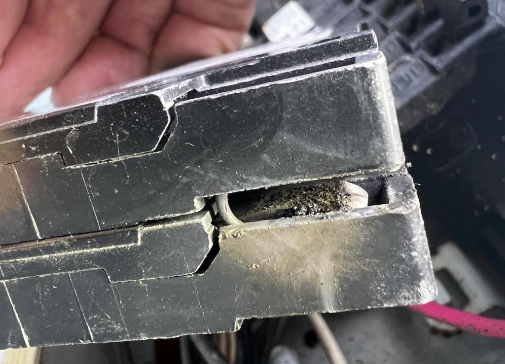 Circuit Breaker Repair Encinitas CA — failed circuit breaker with visible internal damage inspected by a licensed electrician
