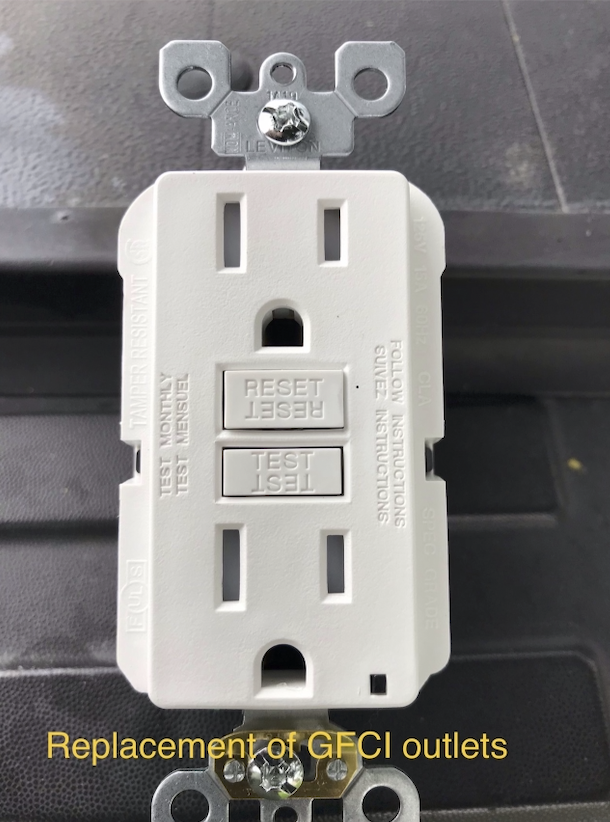 GFCI Outlet Repair Encinitas — licensed electrician replacing a GFCI outlet